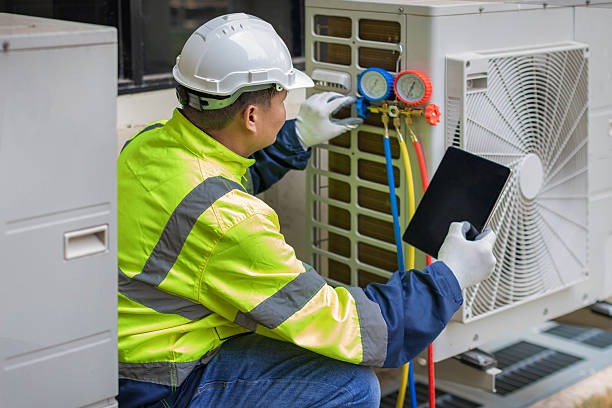 Professional Air Duct Cleaning technician working in Burnett, WI